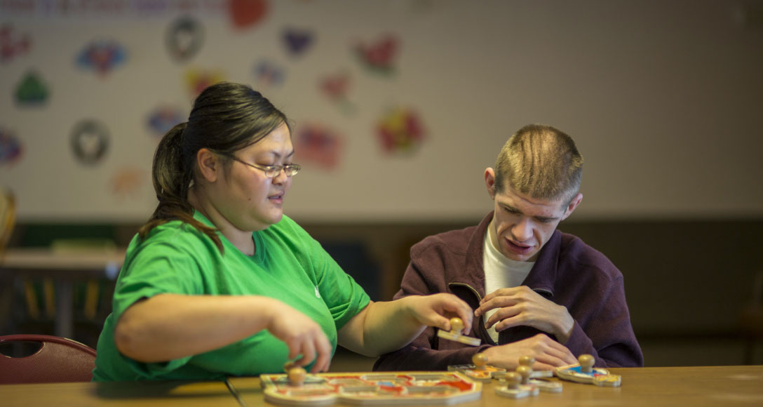 A covey client doing a puzzle.
